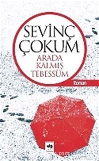 Arada Kalmış Tebessüm