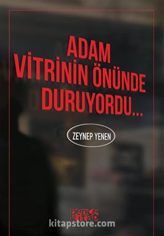 Adam Vitrinin Önünde Duruyordu