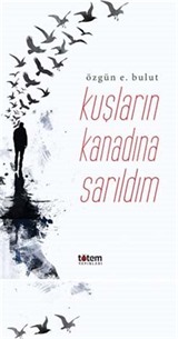 Kuşların Kanadına Sarıldım